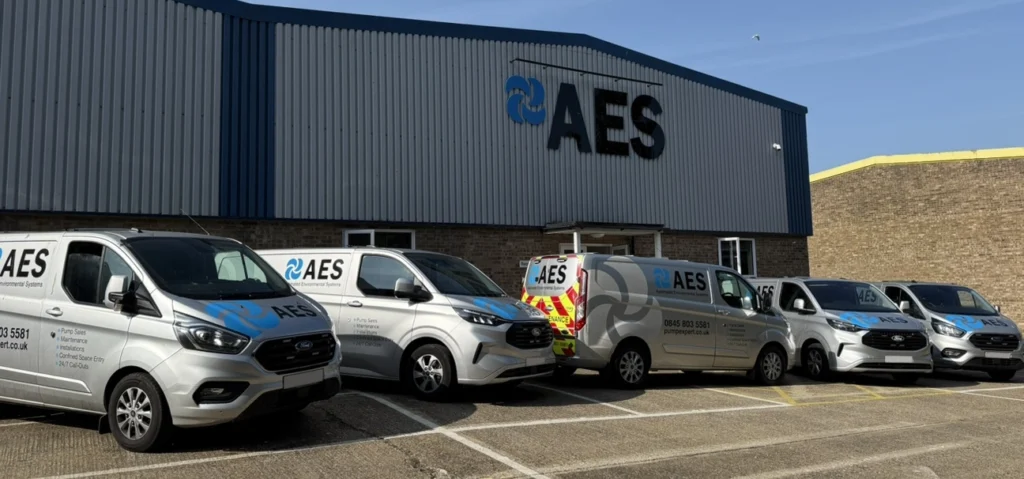 AES Warehouse with fleet of servicing vehicles outside